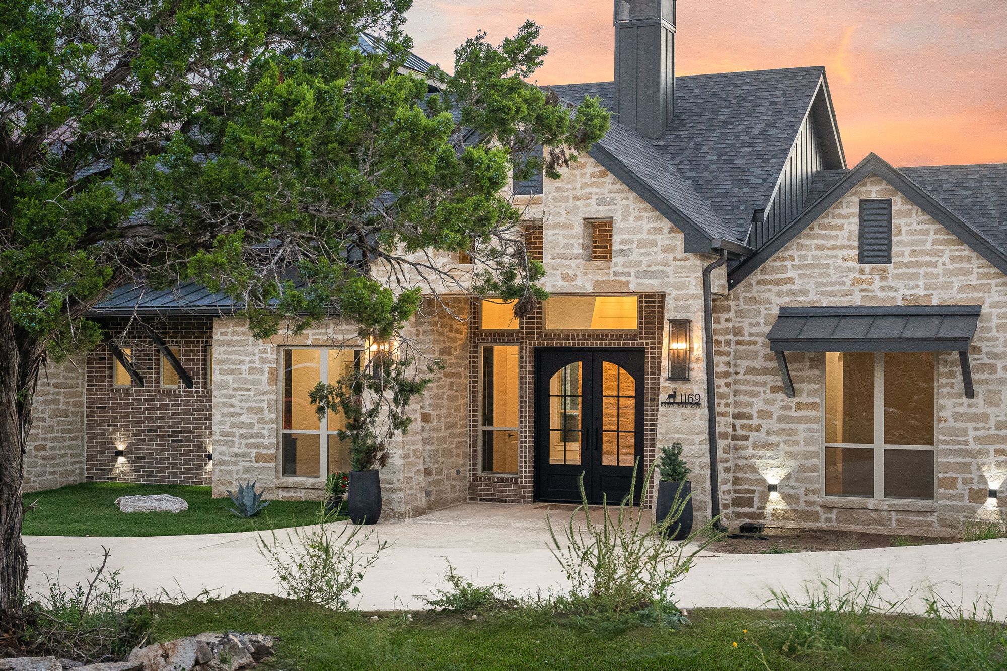 Detailed stone and wood entry — Eternity Builders