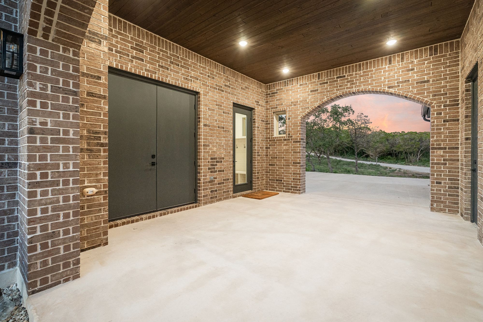 Custom home entry with stone detailing in Mico, Texas