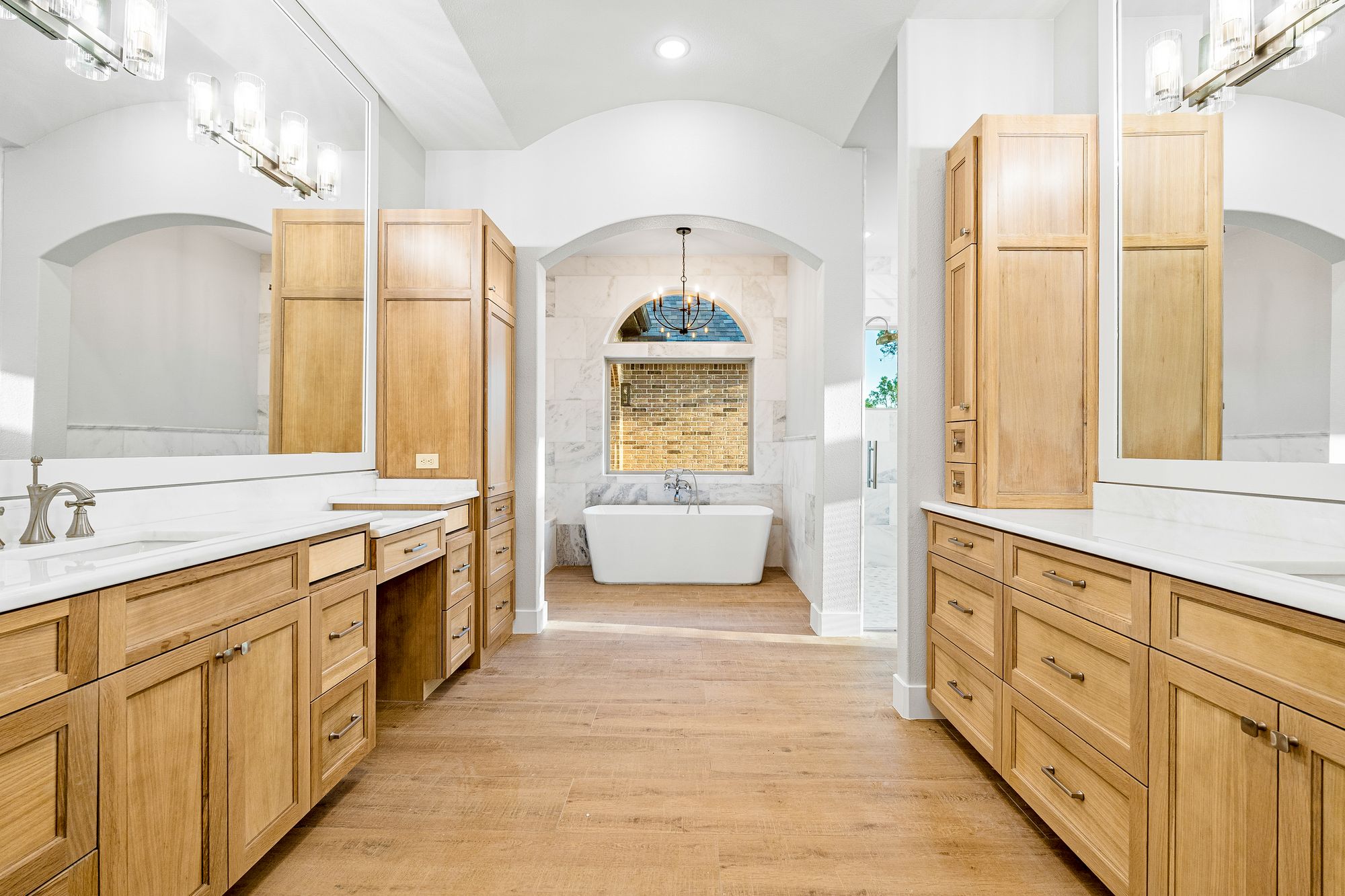 Primary bath with dual vanities and freestanding tub